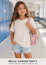 Load image into Gallery viewer, Bella Canvas Youth Tee worn by girl in school hallway